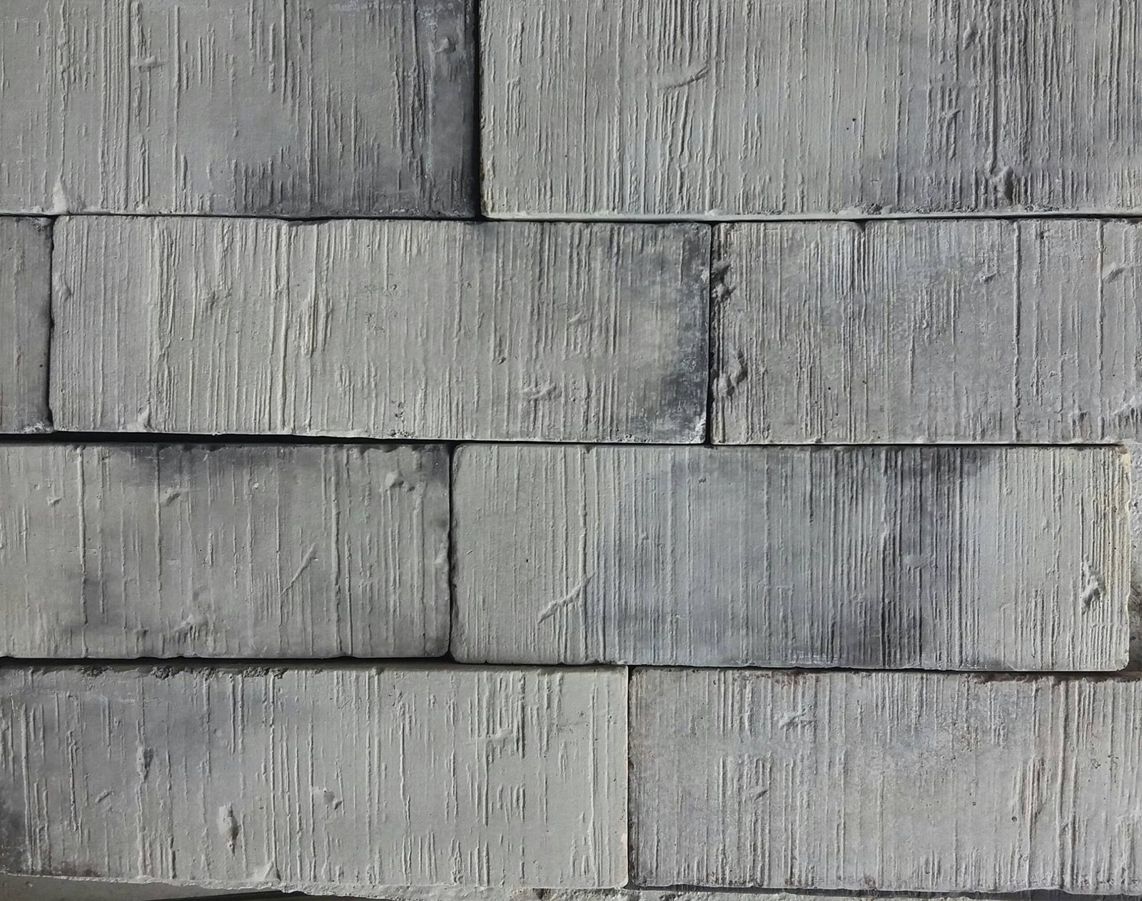 Wire Cut Gray brick veneer wall by Deco Rock