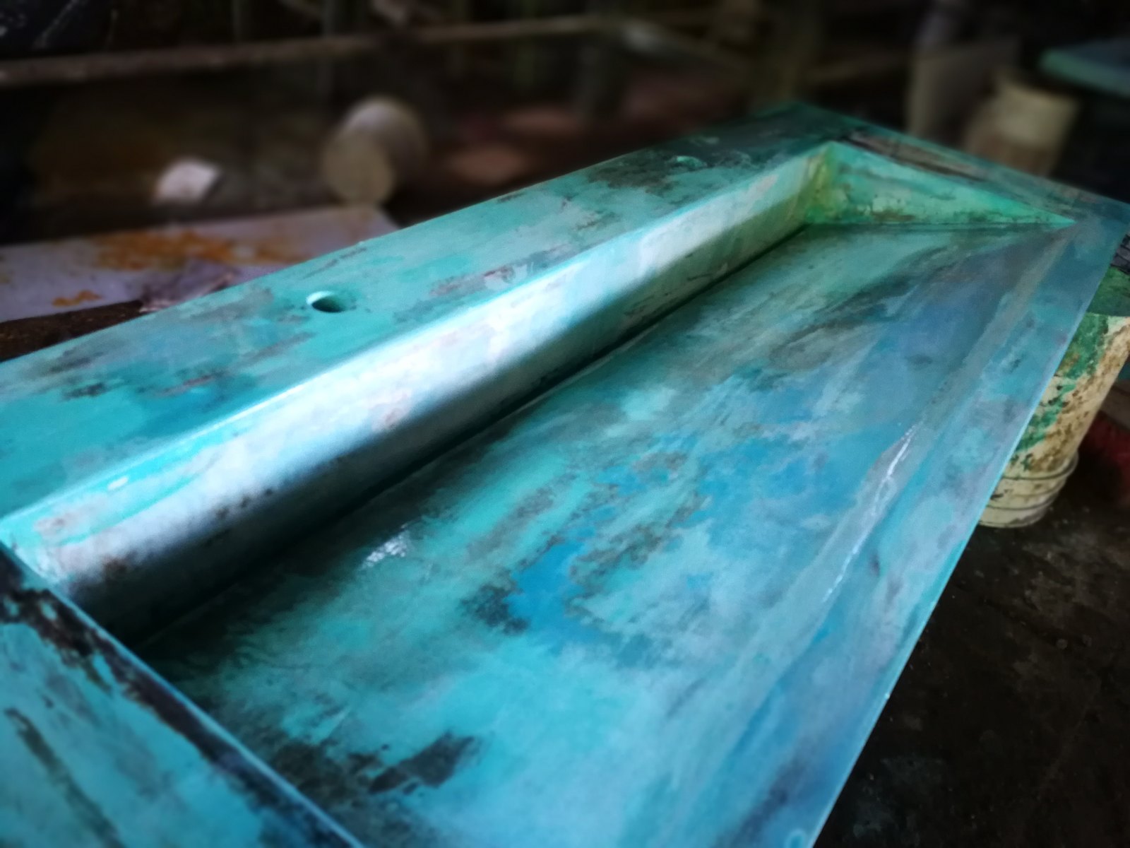 Lavatorio de concreto en acabado turquesa